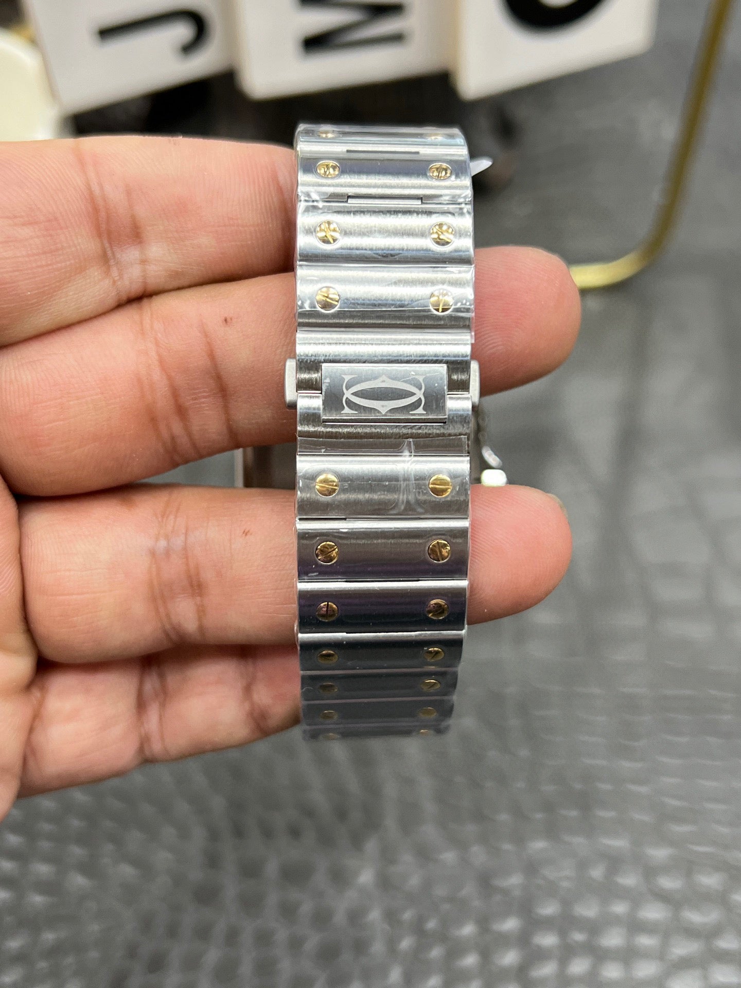 Cartier Santos de Cartier Ref. W2SA0009 “Large Model Steel / Yellow Gold / Silver Opaline Dial