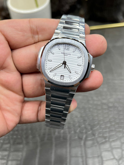 Patek Philippe Nautilus Ref. 7118/1A-010 “35.2mm Steel / Silvery Opaline Dial