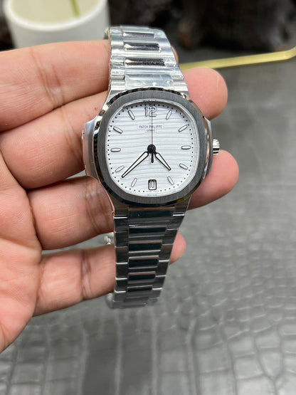 Patek Philippe Nautilus Ref. 7118/1A-010 “35.2mm Steel / Silvery Opaline Dial