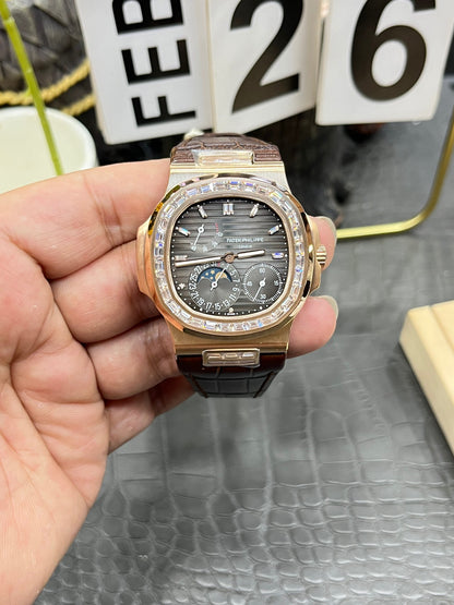 he Patek Philippe Nautilus 5712/1R-001 is a distinguished model in the Nautilus collection, renowned for its elegant design and sophisticated complications.