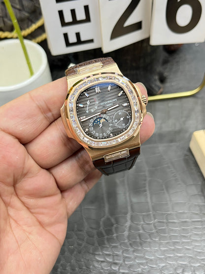 he Patek Philippe Nautilus 5712/1R-001 is a distinguished model in the Nautilus collection, renowned for its elegant design and sophisticated complications.