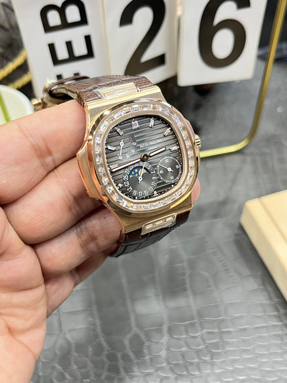 he Patek Philippe Nautilus 5712/1R-001 is a distinguished model in the Nautilus collection, renowned for its elegant design and sophisticated complications.
