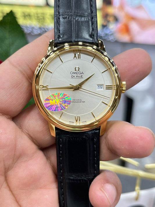 Omega De Ville из 18-каратного золота