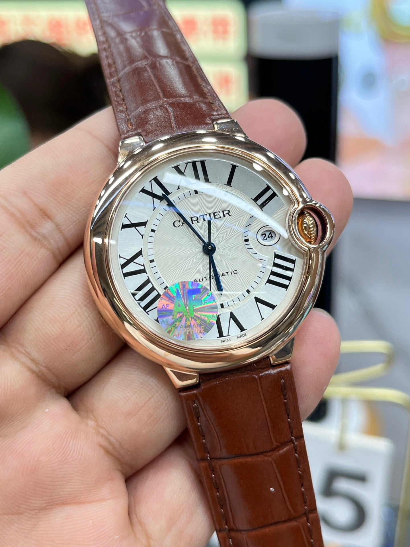 Cartier Ballon Bleu de Cartier WGBB0039 (Cartier Ballon Bleu de Cartier 42 мм, розовое золото, синий циферблат)