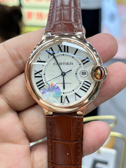 Cartier Ballon Bleu de Cartier WGBB0039 (Cartier Ballon Bleu de Cartier 42 мм, розовое золото, синий циферблат)