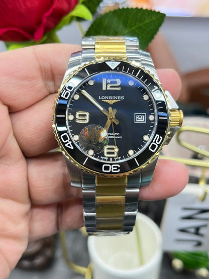 Longines Conquest L3.781.3.56.7 (Longines Conquest двухцветный)