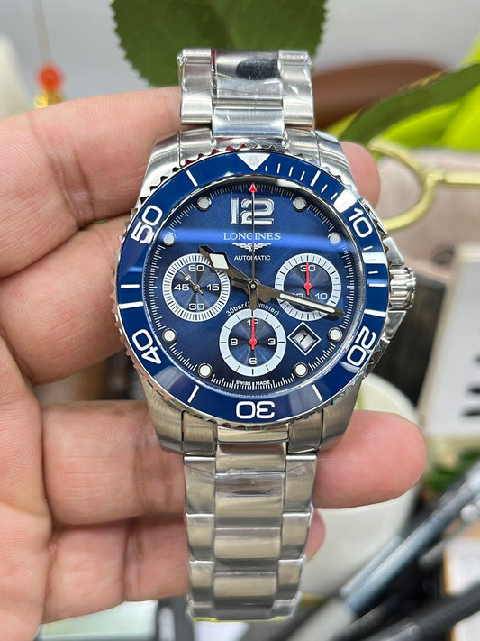 Longines Conquest Chronograph L3.883.4.96.6 (Longines Conquest Chronograph с синим циферблатом)