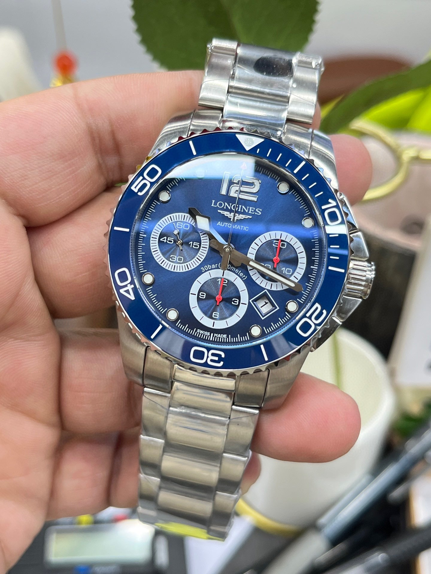 Longines Conquest Chronograph L3.883.4.96.6 (Longines Conquest Chronograph с синим циферблатом)