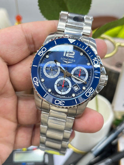 Longines Conquest Chronograph L3.883.4.96.6 (Longines Conquest Chronograph с синим циферблатом)