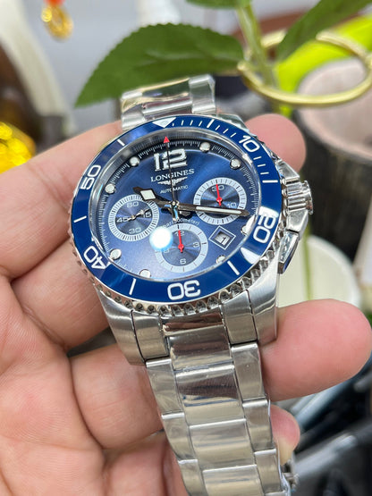Longines Conquest Chronograph L3.883.4.96.6 (Longines Conquest Chronograph с синим циферблатом)