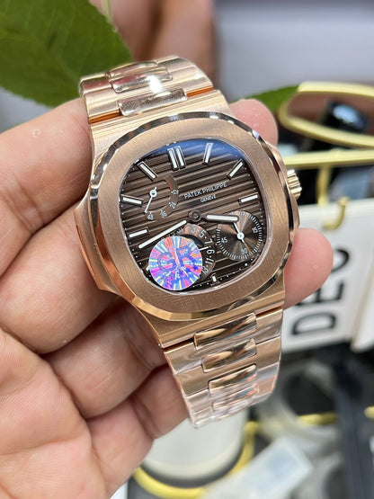 Patek Philippe Nautilus 5712/1R-001 (Patek Philippe Nautilus из розового золота)