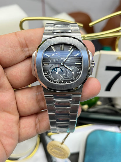 Patek Philippe Nautilus 5712G-001 (Patek Philippe Nautilus «President», белое золото)