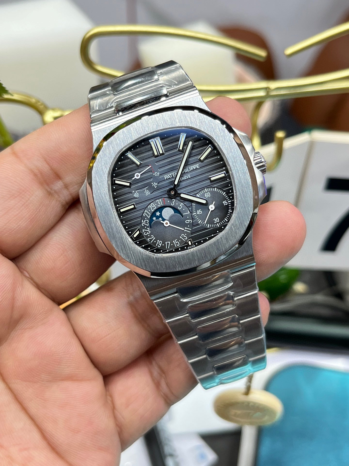 Patek Philippe Nautilus 5712G-001 (Patek Philippe Nautilus «President», белое золото)
