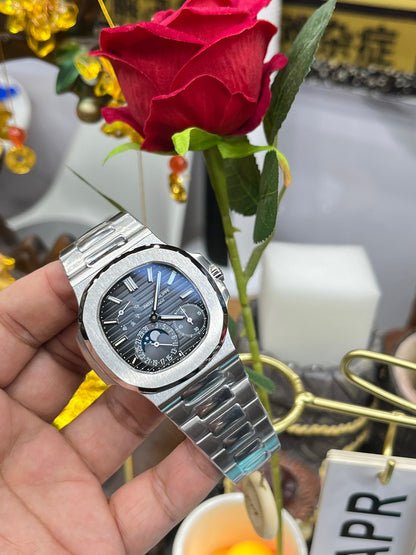 Patek Philippe Nautilus 5712G-001 (Patek Philippe Nautilus «President», белое золото)