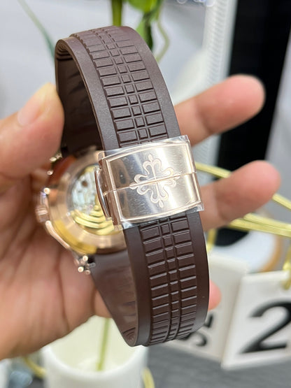 Patek Philippe Aquanaut Travel Time 5164R-001 («Акванавт Travel Time», «граната», розовое золото)