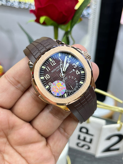 Patek Philippe Aquanaut Travel Time 5164R-001 («Акванавт Travel Time», «граната», розовое золото)
