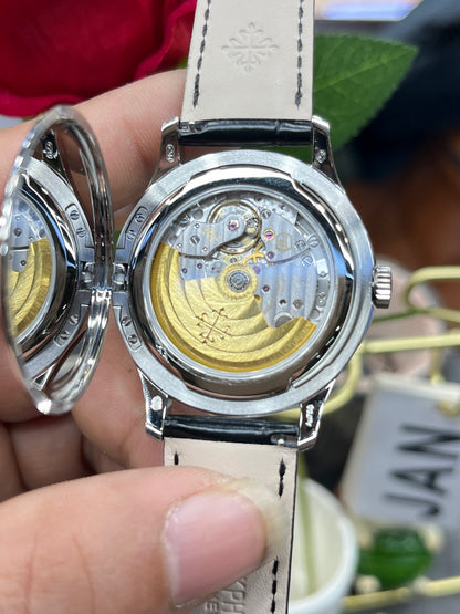 Patek Philippe Calatrava 5227G-001 (Patek Philippe Calatrava «флип-кейс», белое золото)