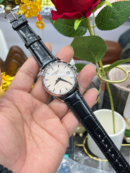 Patek Philippe Calatrava 5227G-001 (Patek Philippe Calatrava «флип-кейс», белое золото)