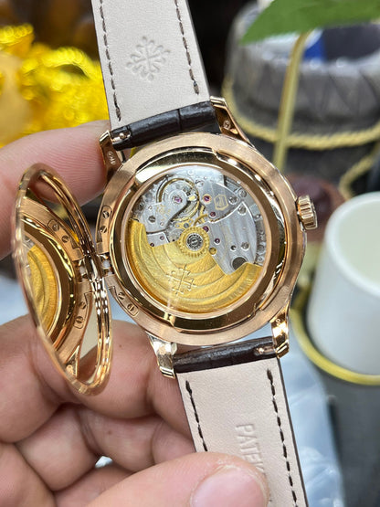 Patek Philippe Calatrava 5227R-001 (Patek Philippe Calatrava «флип-кейс», розовое золото)